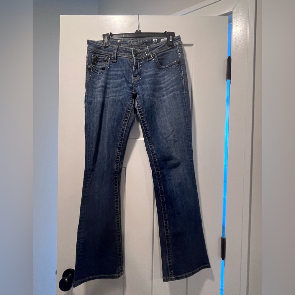 Miss me jeans with Fleur de Lis on back pocket